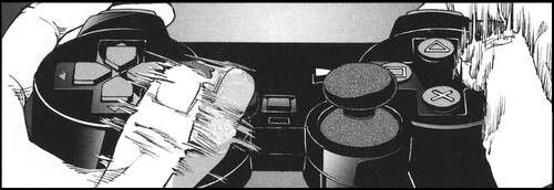 hands playing with a controller